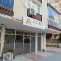 Aura Bayan Kuaförü logosu