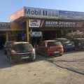 Gezer Otomotiv Volkswagen Opel Özel Servisi-Kamuran Gezer logosu