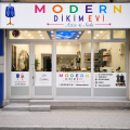 Modern Dikim Evi logosu