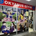 OKYANUS OKUL KIYAFETLERİ logosu