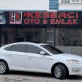 Öz keserci otomotiv & emlak logosu
