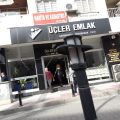 Üçler Emlak logosu