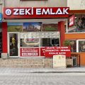 ZEKİ EMLAK logosu